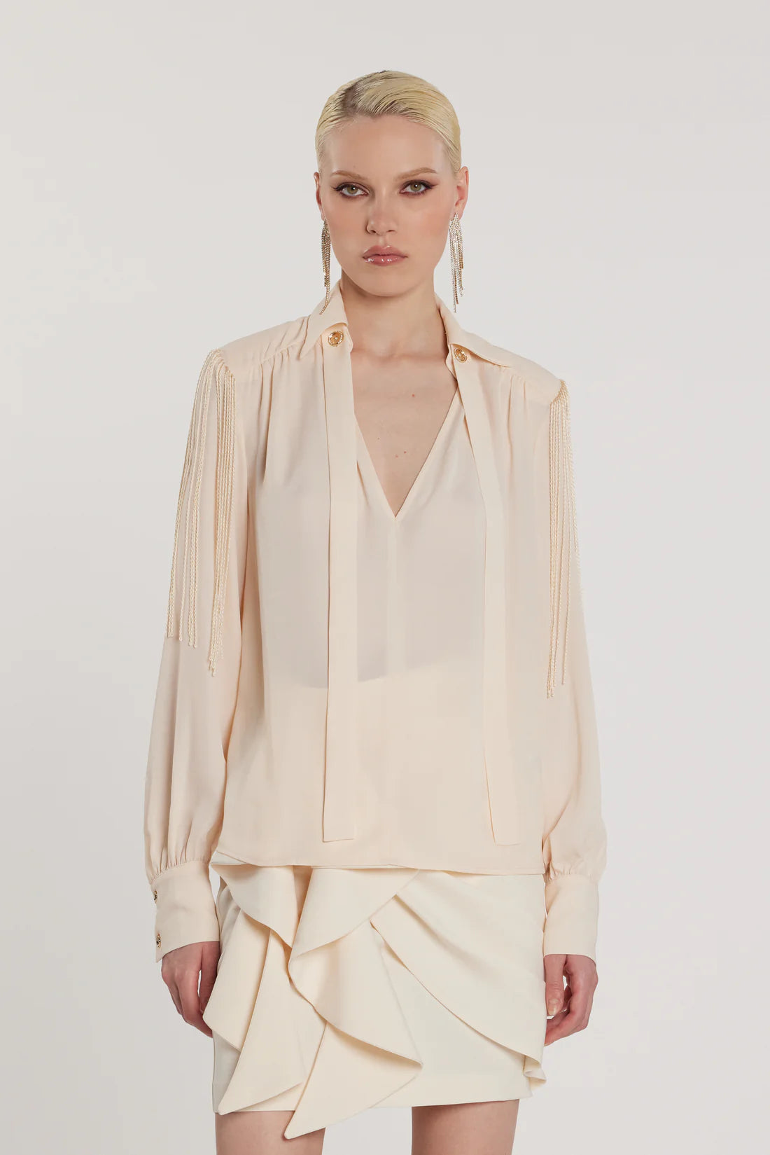 Relish Blusa FLAPS scollo a V maniche lunghe più fusciacca più frange