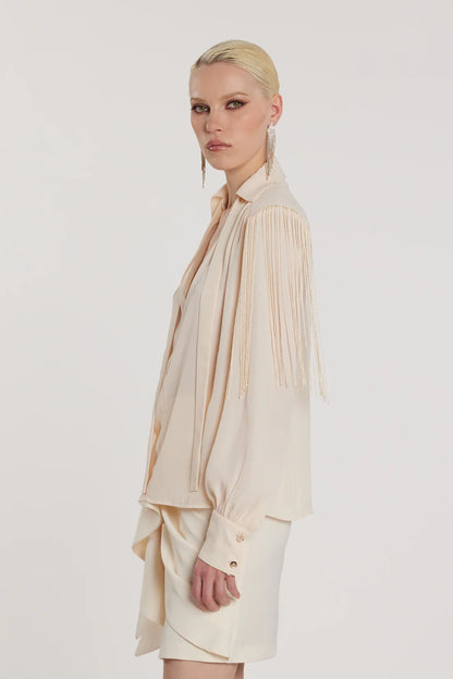 Relish Blusa FLAPS scollo a V maniche lunghe più fusciacca più frange