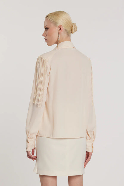 Relish Blusa FLAPS scollo a V maniche lunghe più fusciacca più frange